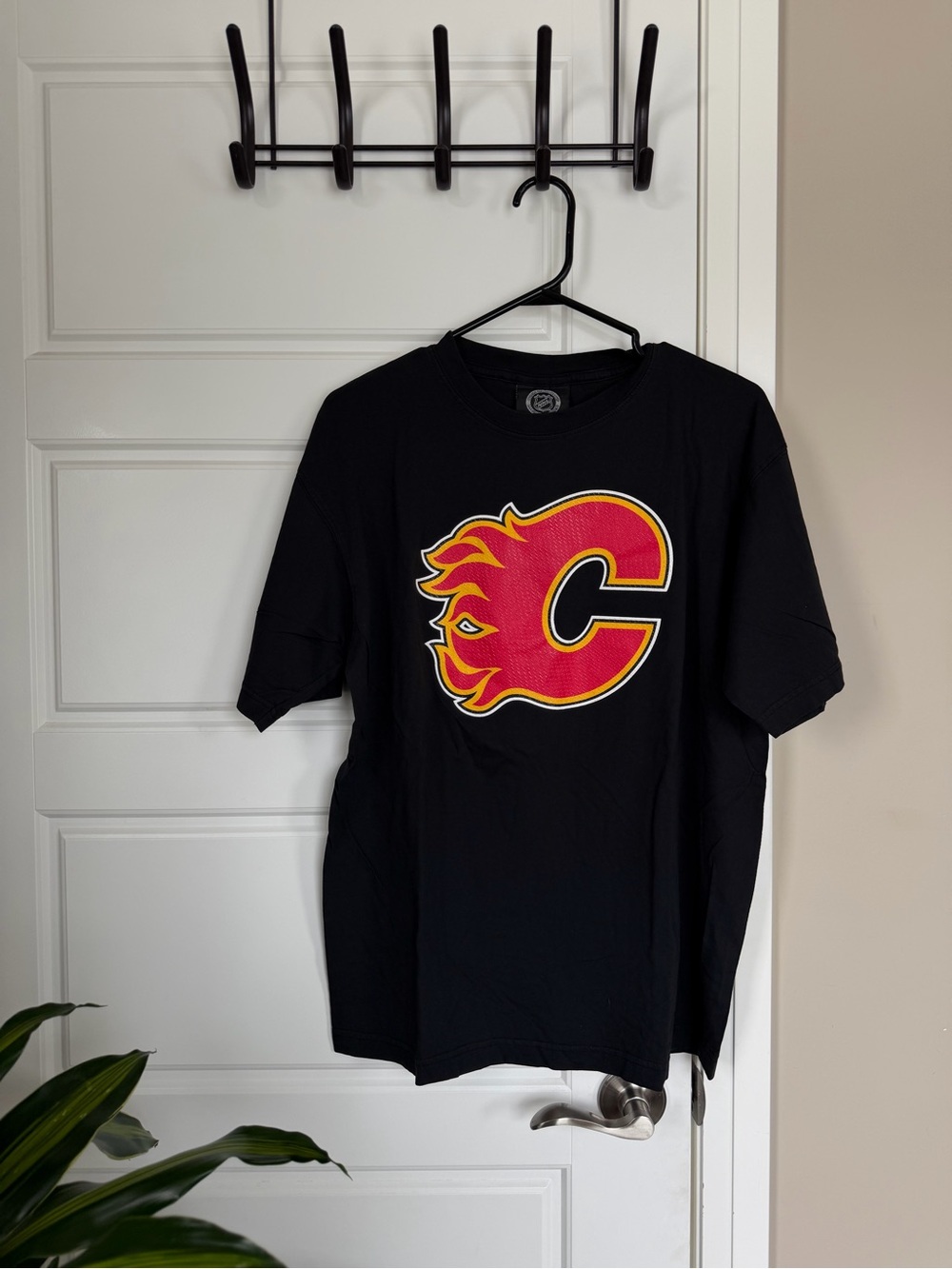 Black Men's NHL Calgary Flames Hockey Logo Tee with Red & Yellow Accent